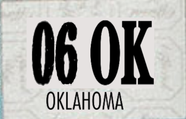 Oklahoma registration decal showing month 06, county code OK and the word Oklahoma